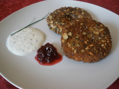 Kürbisschnitzerl in kerniger Panade Rezept