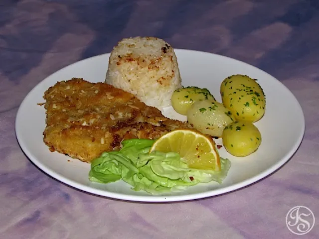 Putenschnitzel mit Mandelpanier