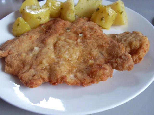 Putenschnitzel paniert
